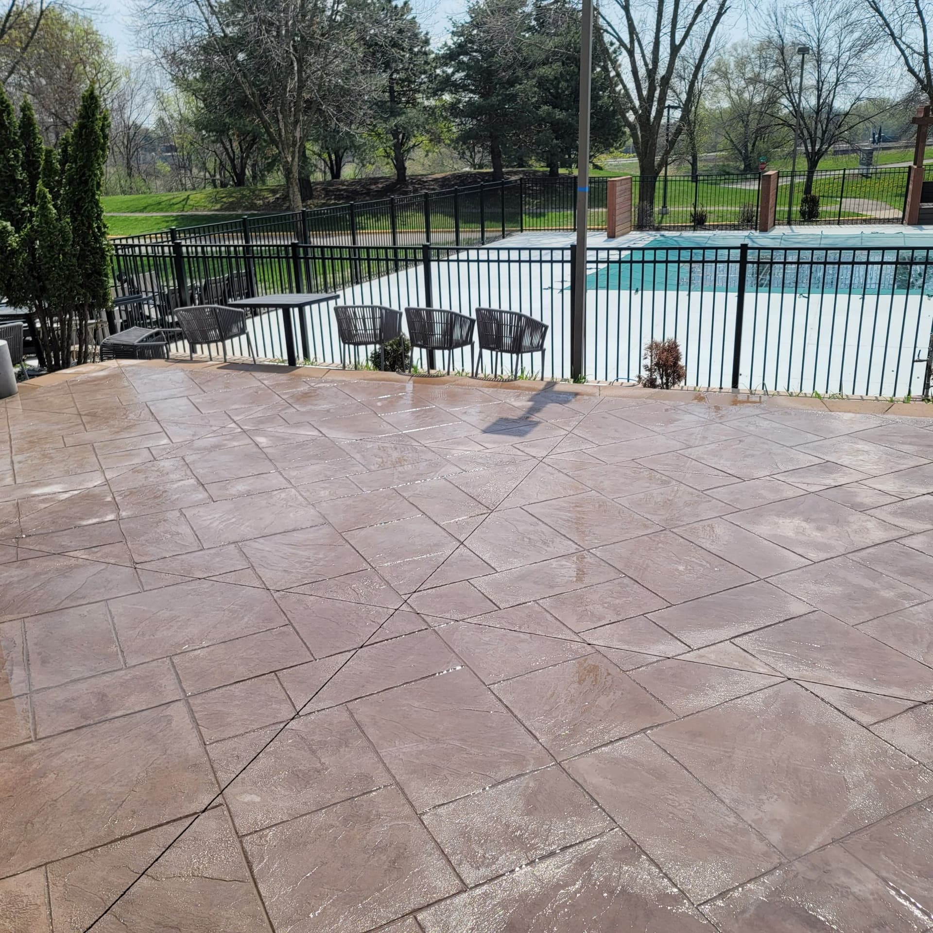 Stamped Concrete Patio Adds Style to Apartment Building image