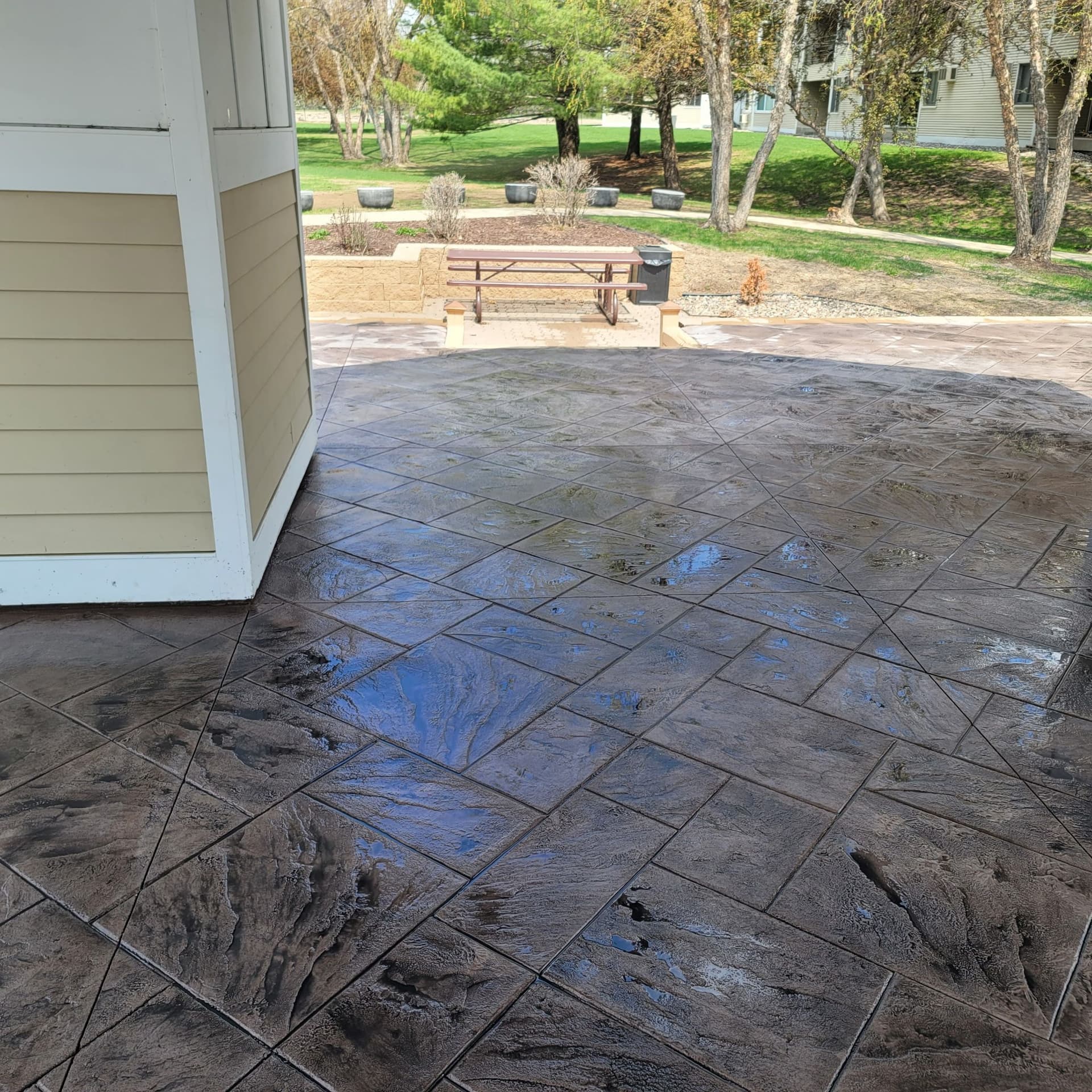 Gallery photos for Stamped Concrete Patio Adds Style to Apartment Building: Image #2